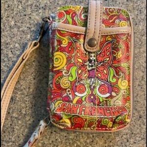 SAKROOTS wristlet and phone case. New, never used.